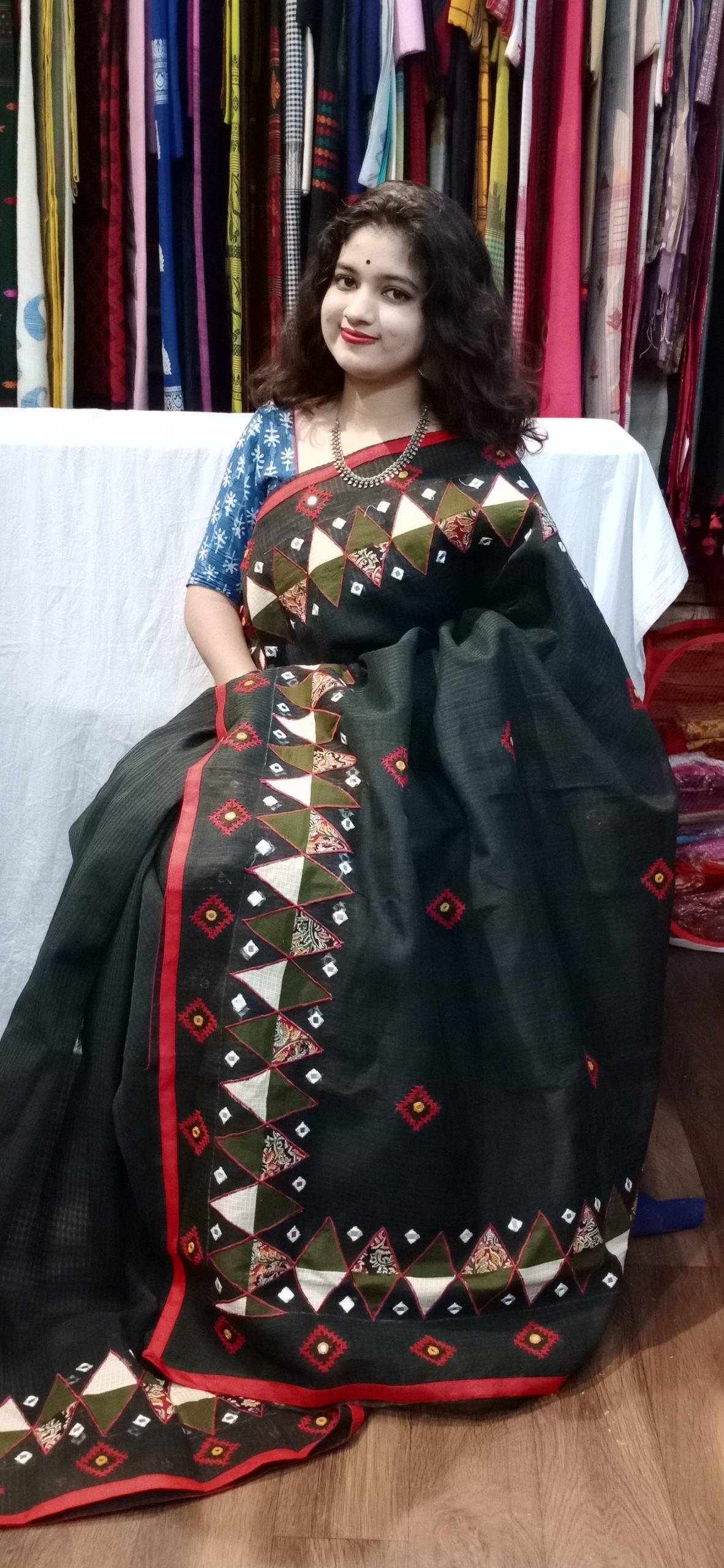 Stitched work on Reshom kota