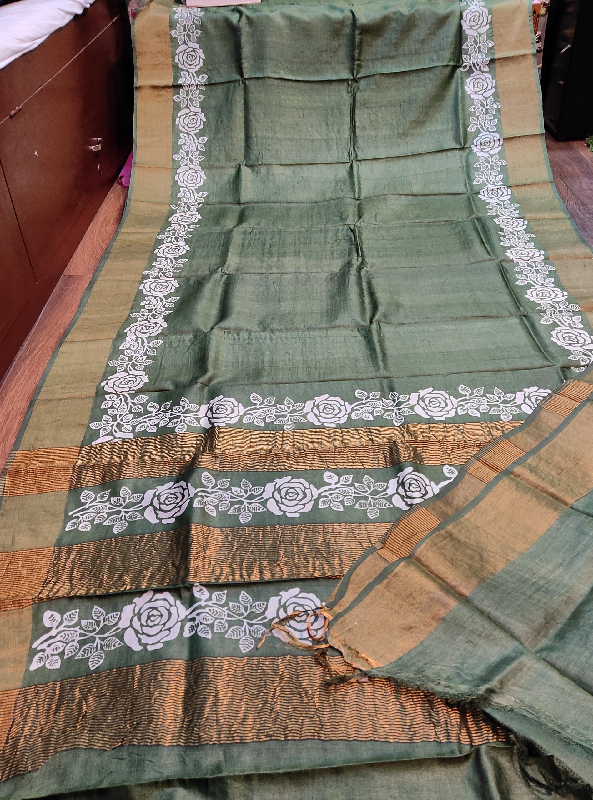 Bottle green colour pure gachi tusser saree with white discharge block and running green b.p