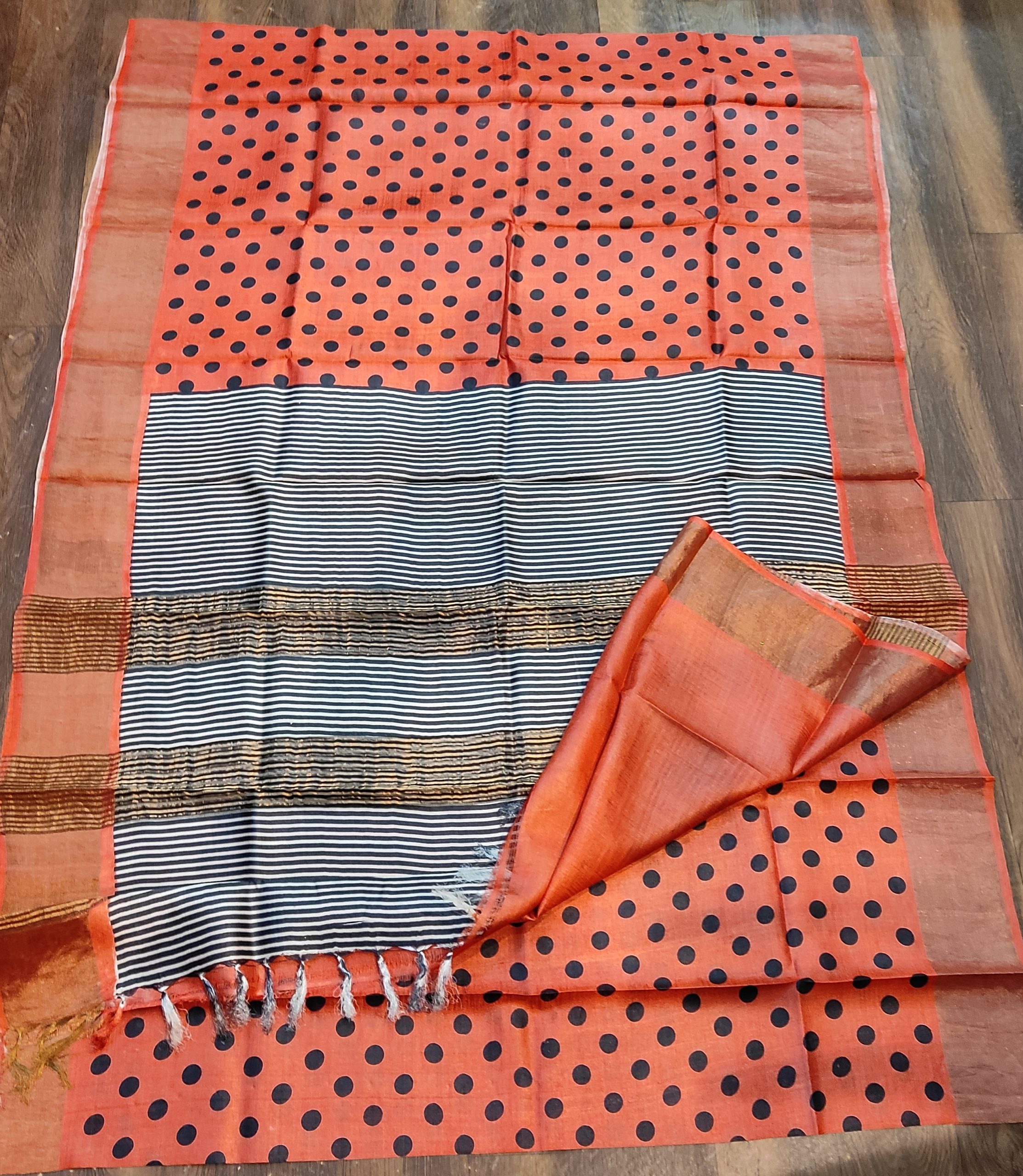 Orange and black pure gachi tusser with zari border with running orange b.p